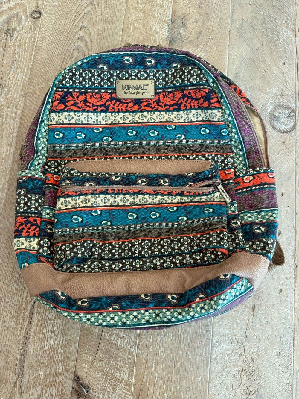 Kinmac Patterned Teal & Orange Backpack with builtin charger